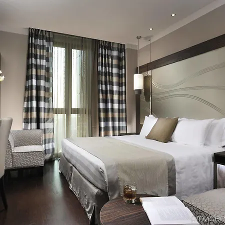 Uptown Palace Milan Room photo